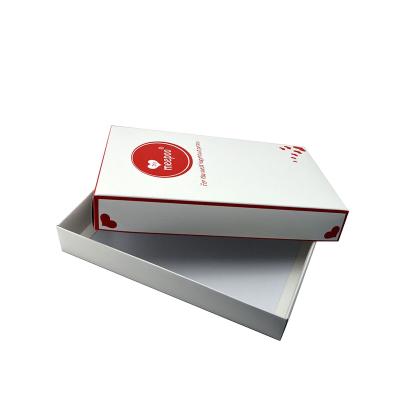 China Recyclable Custom Design Luxury Light Color Printed Cardboard Clothes Storage Paper Boxes for sale