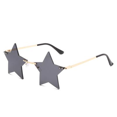 China Fashion Sunglasses Hot Selling Transparent Colors Party Funny Vintage Summer Party Star Sun Glasses Woman Rimless Glass for sale