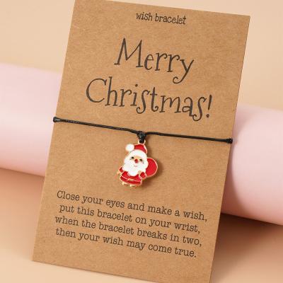 China Fast Delivery Hot Sale Santa Claus Pendant Adjustable String Bracelet Charms Cardboard Christmas Homemade Braided Bracelet for sale