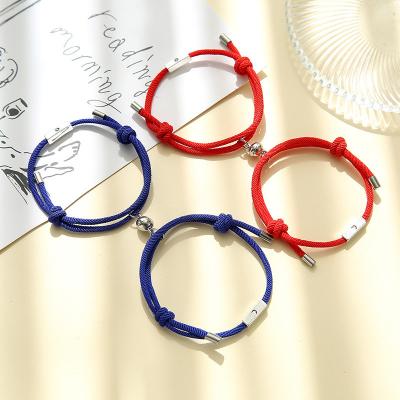 China Fast Delivery Couples Jewelry Alloy Round Shaped Nylon Bottom Couples Bracelets Magnet Sun Moon Charm Rope Magnetic Jewelry for sale