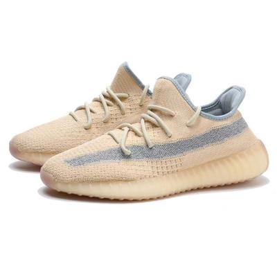 China Breathable Comfortable Running Sneakers Fly Knitting Upper Sports Shoes Yeezy Sneakers for sale