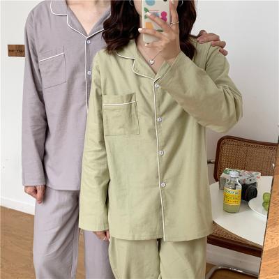 China New QUICK DRY fall/winter spinning cotton wool loose color men's and women's pajamas set warm comfortable cotton pajamas for sale