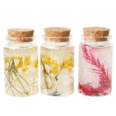 China Birthdays Wholesale Aromatherapy Candles Hand Make Smokeless Glass Scented Candle With Flowers Gel Dry Floral Glass Candles for sale