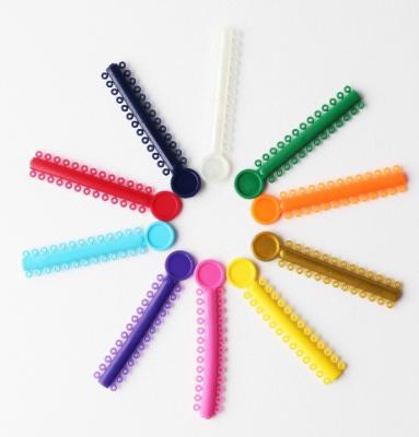 Cina 30 colori legature ortodontiche dentali O anello per strumenti di plastica di classe I in vendita