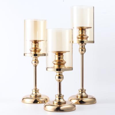 China Home decoration luxury antique nordic wedding led table decoration molds gold metal candle holder crystal glass candlestick holder for sale