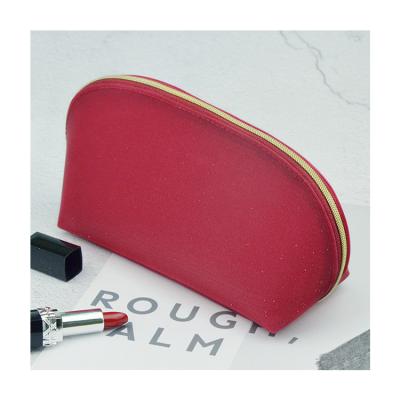 China New Arrival Durable Waterproof Women Luminous Red Custom Logo TPU Makeup Cosmetic Bag For Travel for sale