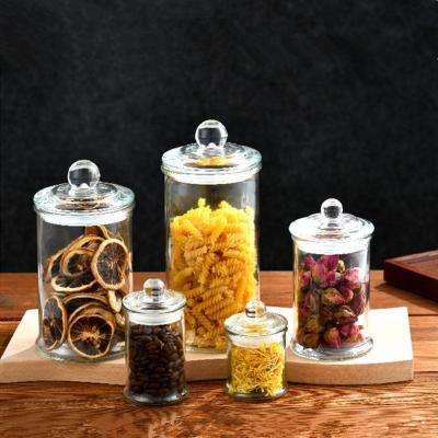 China Multifunctional Sealed Clear Glass Candy Tea Coffee Storage Jar Cereal Beans Spice Jar With Glass Lids for sale