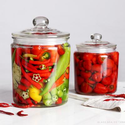 China Multifunctional Round Sealed Glass Storage Jar With Clear Glass Cover Candy Tea Coffee Cereal Grains Spice Jar for sale