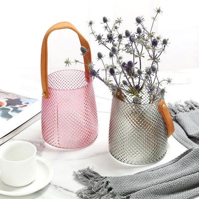 China Small Contemporary Modern Glass Handbag Vase Tabletop Clear Decorative Glass Flower Vases For Home Decor for sale