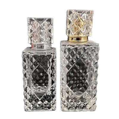 China Cosmetic Refillable Empty Spray 50ml Luxury Clear Glass Perfume Bottle For Men And Women for sale