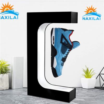 China Wholesale Hot Selling Magnetic Levitating Levitatin NAXILAI Magnet Display Stand Customized Acrylic Magnetic Levitation Shoe Display Floating for sale