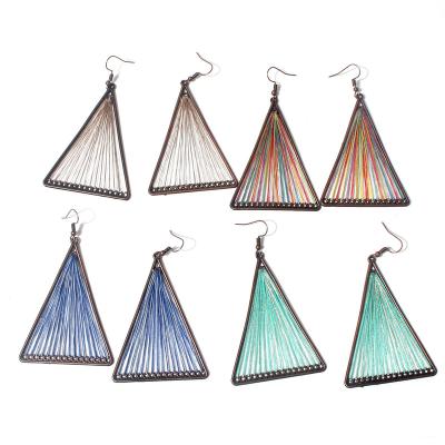 China Durable Ethnic Tassel Earrings Personality Style Triangle Bohemian Earrings Braided Handmade Earrings for sale