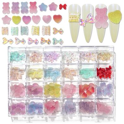 China Nail Art Decoration 24 Grids Aurora Crystal Candy Bow Heart Bear Nail Decoration Jewelry Gummy Rhinestones Nail Art Set for sale