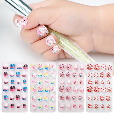 China Kid nail tips; tips 24 pcs stars candy bow cartoon child artificial nail tips child press on nails for sale