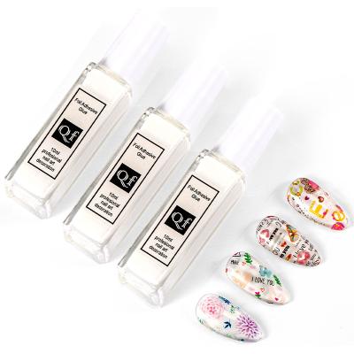 China Nail Polish Gel 10ml Transfer Foil Sticker Starry Paper Print Foils Wraps For Nailing Adhesive Foil Gel Nail Polish Glue for sale