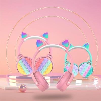 China Gift Kids Stress Reliever Stereophone Headset Autism Silicone Earbud Rainbow Push Sensory Bubble Unicorn Fidget Earphone for sale