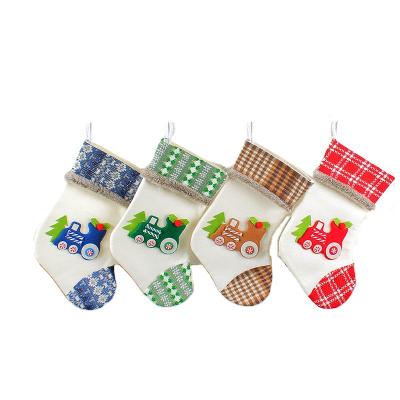 China Factory Wholesale Eco-friendly Christmas Products Christmas Tree Decoration Train Christmas Stocking For Children's Gift Bag In Bulk for sale