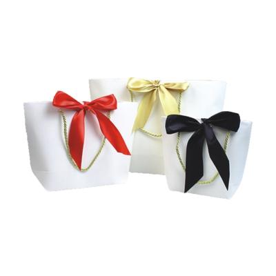 China Custom New Product Flat Bottom Art Paper Gift Bag Moisture Proof With Ribbon Your Own Logo For Handle Shopping Bags for sale