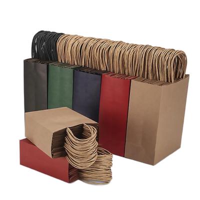 China Biodegrable / Compostable Wholesale Custom Craft Brown Kraft Shopping Paper Bags With Handle for sale