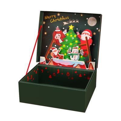 China Christmas Gift Wrapping Recyclable Paper Box With 3d Santa Cut Out Snowflake Inside Square Gift Wrapping 29*20.5*10cm for sale