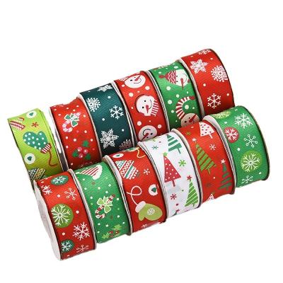 China Christmas Gift Wrapping Decoration New Gift Wrap Ribbon Design Customized Ribbon 100% Polyester Satin Designs Rolls for sale