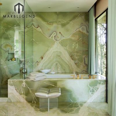 China Modern bathroom interior floor and wall bookmatched polished natural light green onyx tile for sale