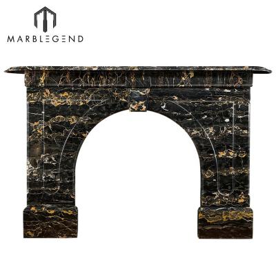 China Traditional Electric Egyptian Fireplace Mantel Factory Price Black Marble Fireplace Mantel Surround for sale