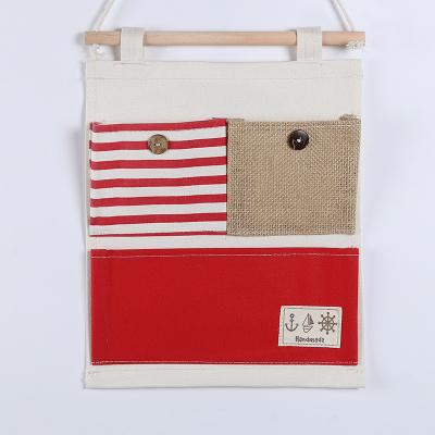 China hanging storage bag pockets organizer door wall chest holder customized blue red for sale