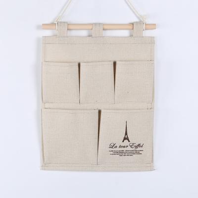 China Puting hanging storage bag pockets organizer door wall chest holder customized white Eiffel for sale