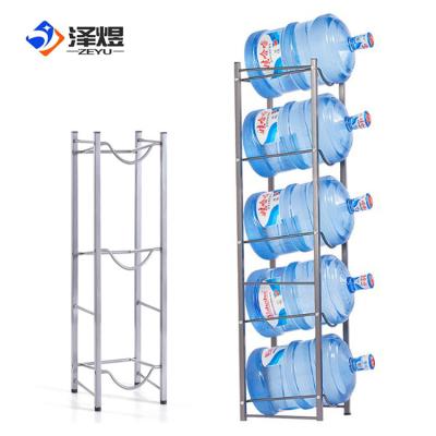 China Sustainable Heavy Duty 4 Tier Floor White Metal 5 Gallon Water Bottle Storage Rack for sale