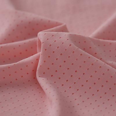 China Breathable 15.5% Nylon Spandex Stretch Hole 84.5% Summer Sample Bright Quick Dry Cool Sportswear Fabric For Sports Tops Nylon Fabric for sale