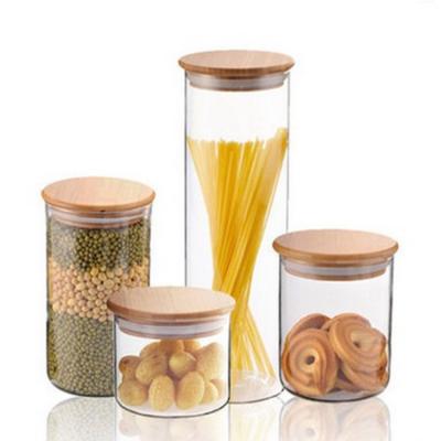 China Sustainable glass material and eco-friendly feature borosilicate glass storage jar with bamboo press lid for sale