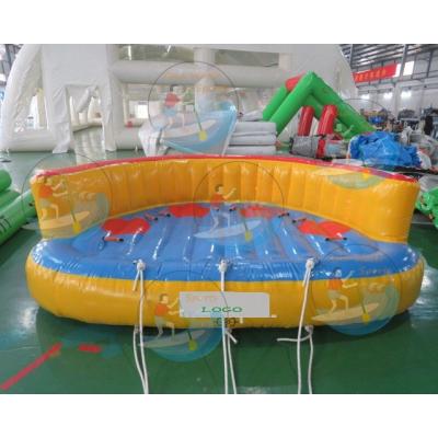 China 0.9mm PVC Tarpaulin Advertising Inflatable Crazy UFO Sofa Floating Island Water Sports Inflatable For Playground for sale