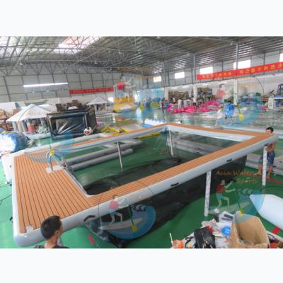 China Plato 0.9mm PVC tarpaulin foldable inflatable yacht ocean sea drop point/floating pool with anti jellyfish net, pool float yacht for sale