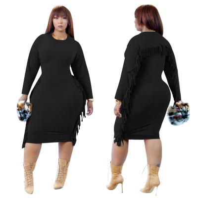 China Anti-pilling XL-5XL women plus size casual O-neck solid dress with tassel edge on both sides back for sale