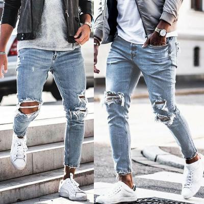 China QUICK DRY denim men's brand fashion street thin-fitting wrinkled feet pants badge ripped tide jeans for sale