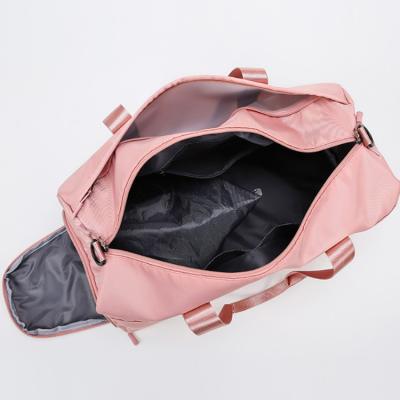 China DUFFLE BAG Pink Travel Tote Designer Sports Gym Women and Man Duffel Bag Custom Yoga Travel with Straps and Shoes Compartment for sale