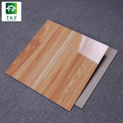 China Modern 60X60 Brown Wood Grain Polished Ceramic Tile Lowest Price Full Glazed Porcelain Floor Tile for sale