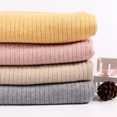 China Anti-Static OEM/ODM Accept Comfortable Knit Brushed Flannel Fleece Fabric For Lady Outerwear for sale