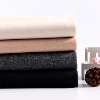 China Factory supply high quality plain brushed anti-static flannel fleece fabric for winter outwear for sale