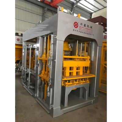 China Factory QT6-15 concrete cement interlocking hollow block brick making machine price in Zambia. for sale