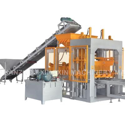 China Quanzhou XINGXIN brand block machine factory building material stores full automatic interlocking brick making machines for sale