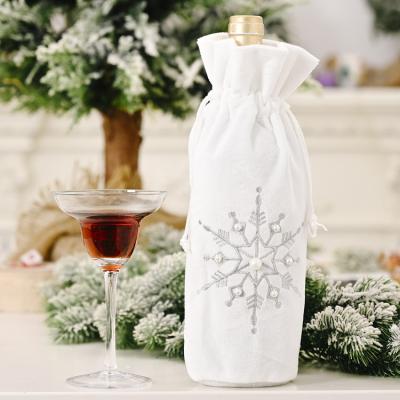 China Fashion Accessories White Color Christmas Wine Bottle Bag Kitchen Decoration Xmas Snowflake Pearl Wine Bottle Cover for sale