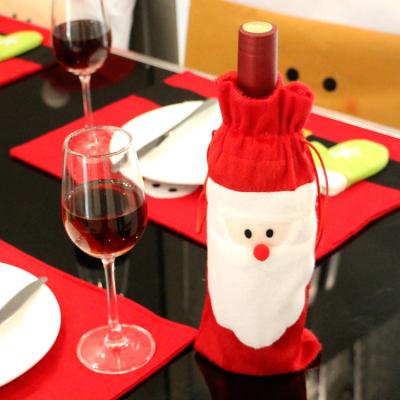 China Cute Christmas Holiday Santa Decorative Liquor Wine Wine Champagne Bottle Cover Creative Red Bag for sale