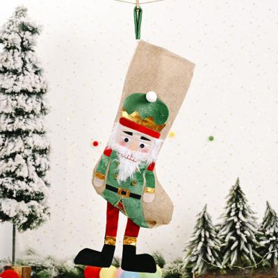 China Walnut Soldier 2021 Navidad Walnut Soldiers Best Selling Kids Toys Canvas Candy Bags Christmas Decorations Christmas Stocking for sale