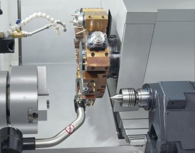 China Torno Automático Universal CNC Torsión y centro de fresado con doble huso en venta