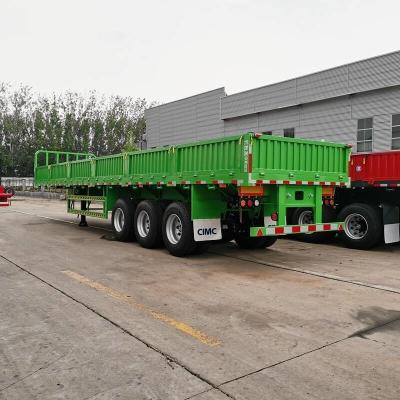 China Dry Cargo 12 Wheel Tri Axle 80T Drop Side Wall Trailer for sale