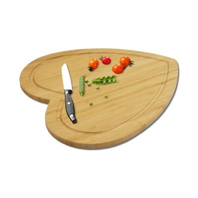 China Viable Wooden Heart Shape Love Chopper Gift Valentines Day Bamboo Cutting Board for sale