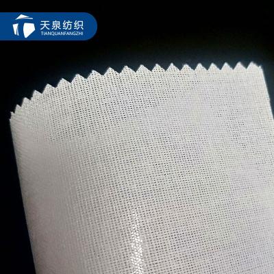 China Factory 100% Polyester Resin Fusible Garment Lining White Fusible Interlining Fabric for sale