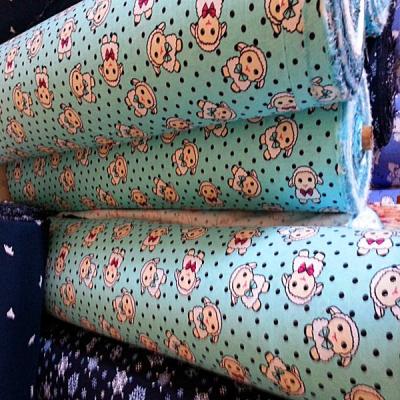 China Stocklot good quality double sided flower print woven flannel fabric 150gsm for kids pajamas for sale